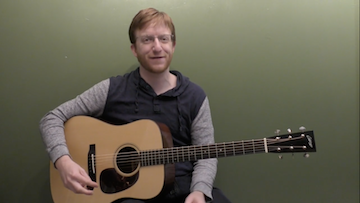 How To Hold The Guitar